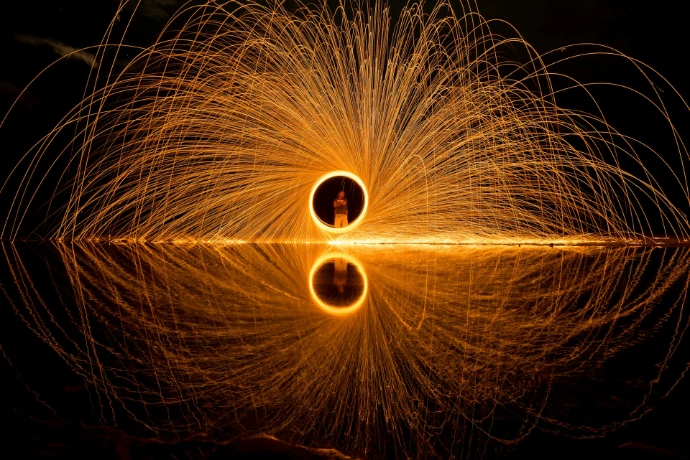 person holding circular light